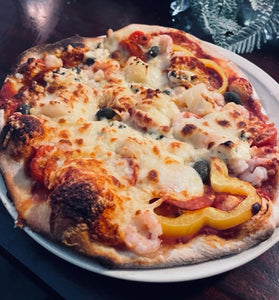Pizzan paisto Kamadossa